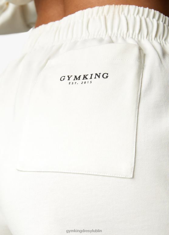 Gym King kobiety uznana koszulka krótka TBB0Z523 odzież krem